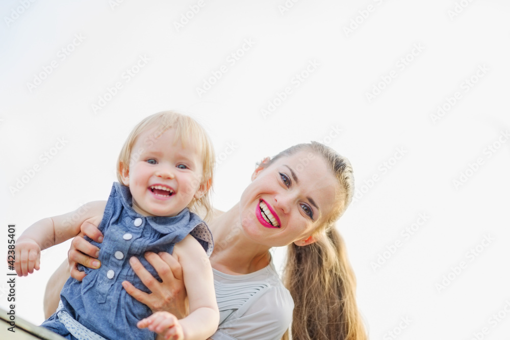 Portrait of smiling mother with kid Portrait of smiling mother with kid