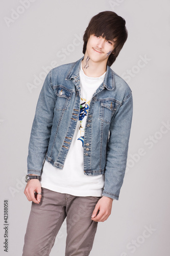 Handsome young man smiling © yalyashenko