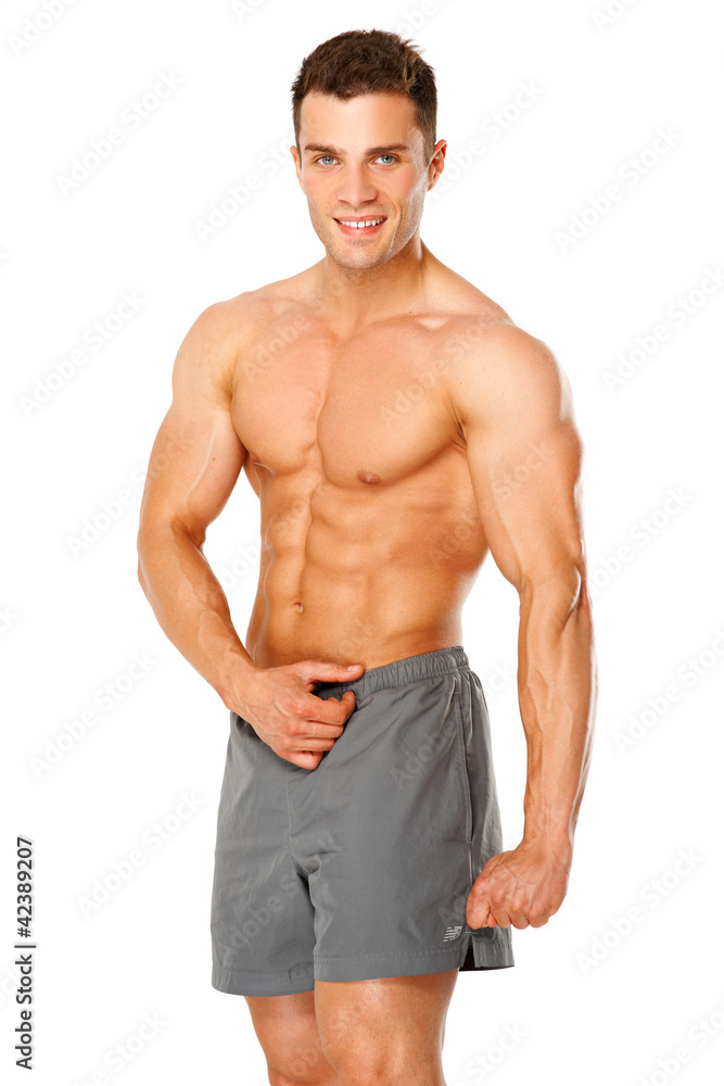 Handsome muscular man isolated on white Handsome muscular man isolated on white