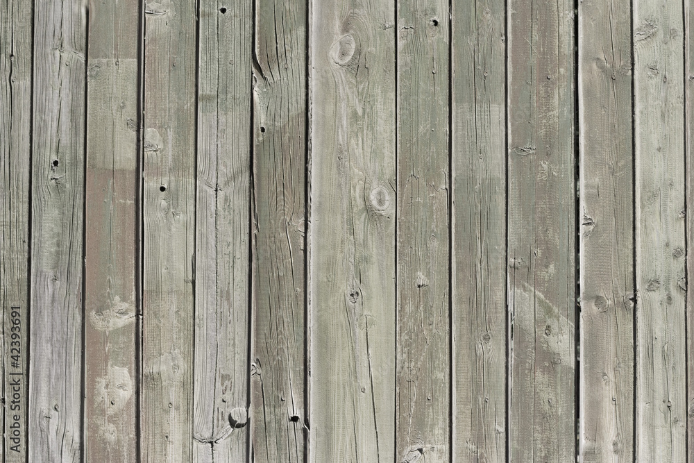 Close up of gray wooden fence panels Close up of gray wooden fence panels