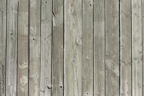 Close up of gray wooden fence panels