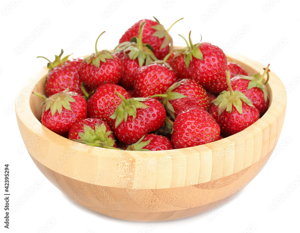 Sweet ripe strawberries in wooden bowl isolated on white Sweet ripe strawberries in wooden bowl isolated on white