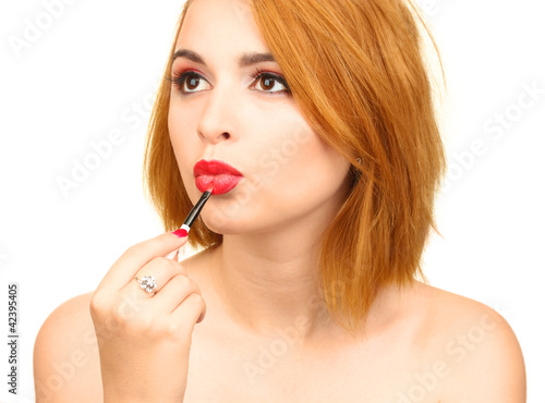 beautiful woman is applying...