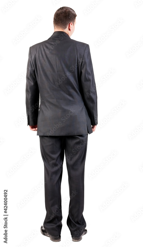 back view of business man in black suit watching. back view of business man in black suit watching.