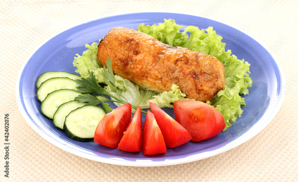Tasty meat cutlet with garnish on plate Tasty meat cutlet with garnish on plate