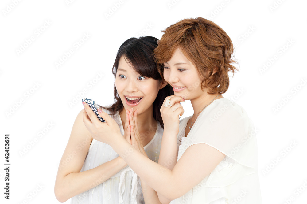 Beautiful young women using a mobile phone. Portrait of asian. Beautiful young women using a mobile phone. Portrait of asian.
