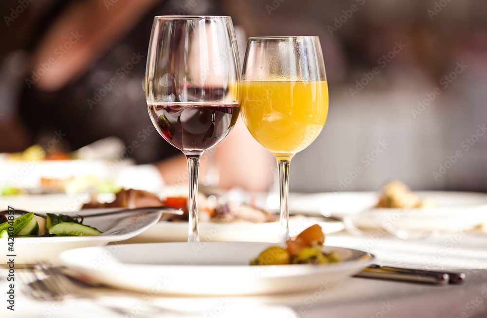 Glasses set with drinks in restaurant Glasses set with drinks in restaurant