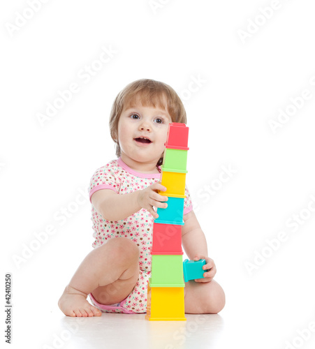 Funny little child playing ...