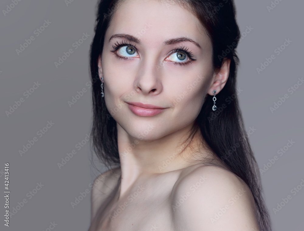 Portrait of beautiful romantic girl with thinking calm eyes look Portrait of beautiful romantic girl with thinking calm eyes look