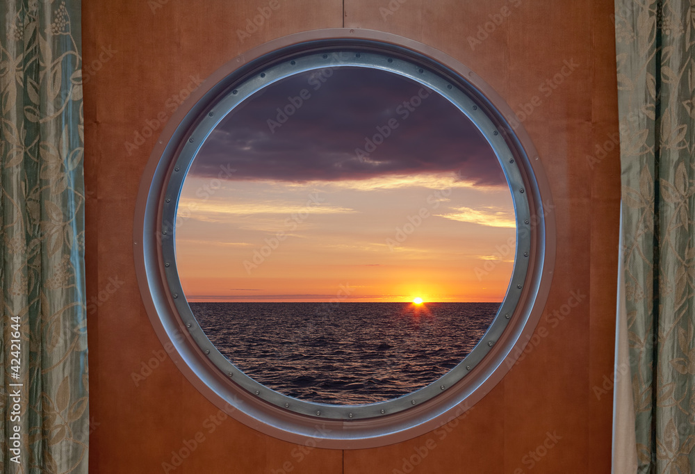 Obraz premium Sunrise Through Porthole