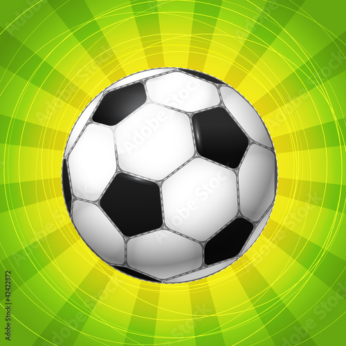 Classic Soccer ball glowing with the rays. vector illustration