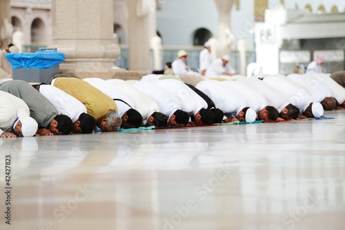 Muslims praying together at Holy mosque