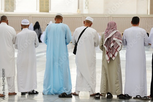 Muslims praying together at Holy mosque