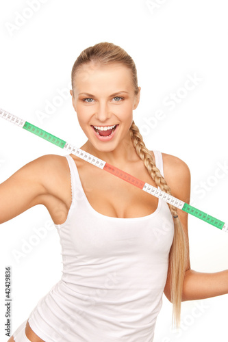 young beautiful woman with measure tape