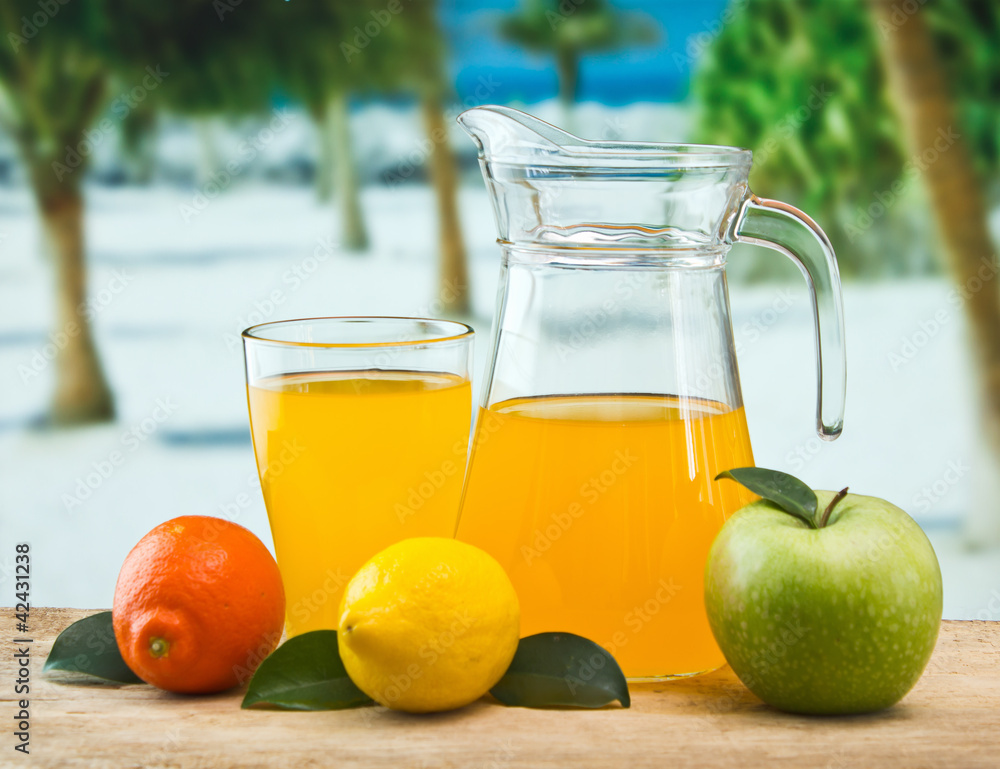 orange juice in a glass on a table orange juice in a glass on a table