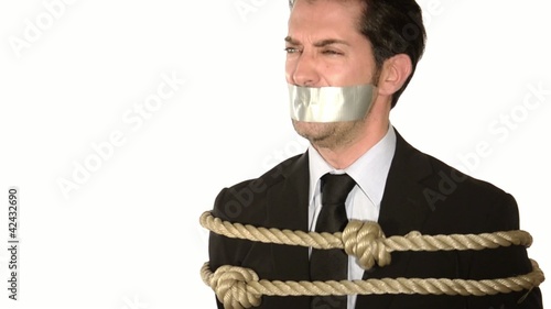 a tied up and gagged businessman photo