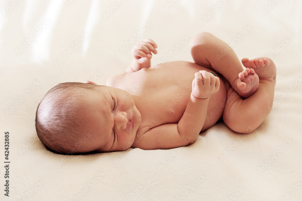Portrait of a one week old baby boy asleep Portrait of a one week old baby boy asleep