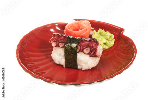 Japanese sushi with meat octopus on a white background