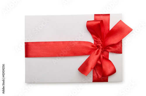 Envelope with colourful ribbon on white © Elnur