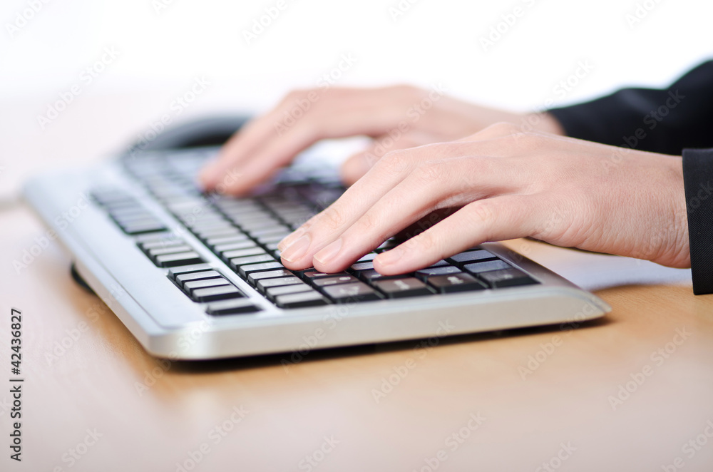 Hands typing on the keyboard Hands typing on the keyboard