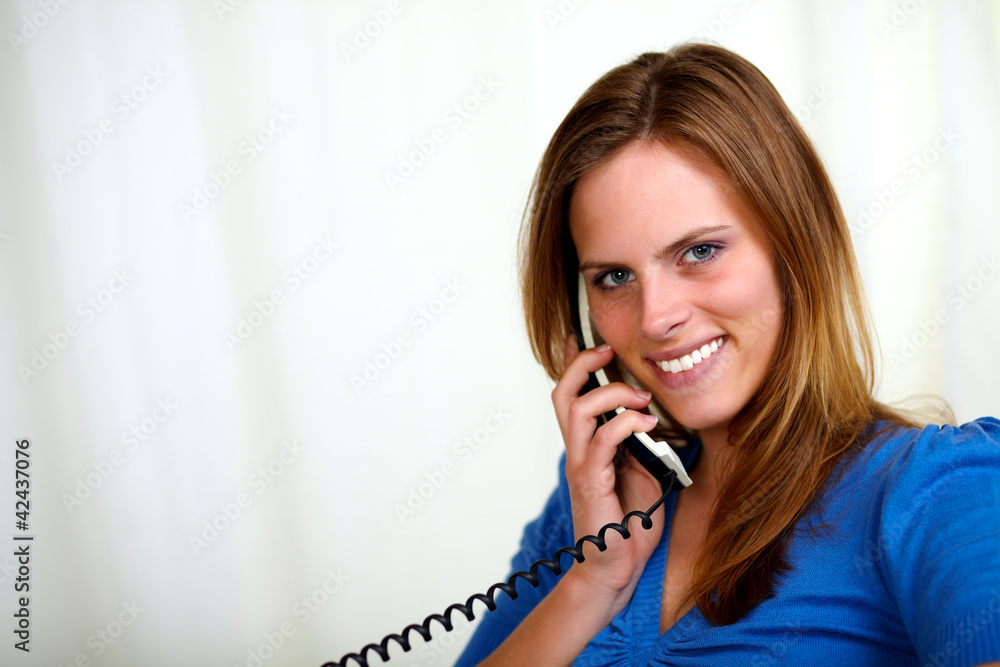 Blonde friendly young lady on phone Blonde friendly young lady on phone