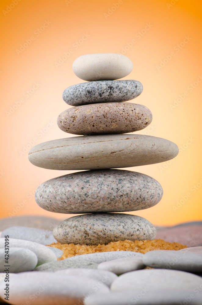 Balanced pebbles with colour background Balanced pebbles with colour background