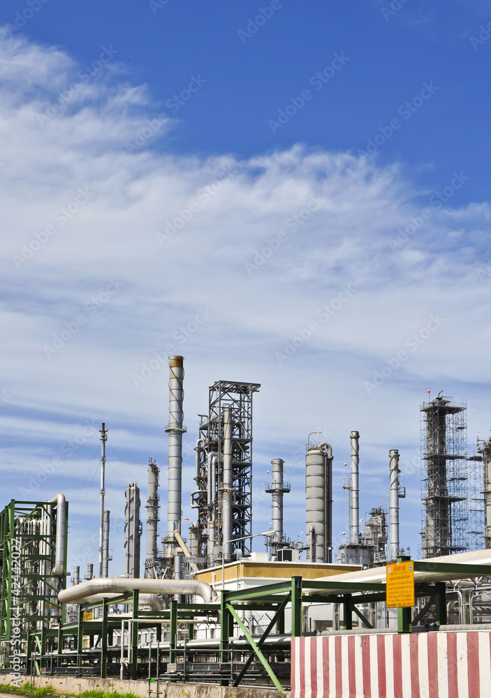 Obraz premium Chemical industrial with light of blue sky 