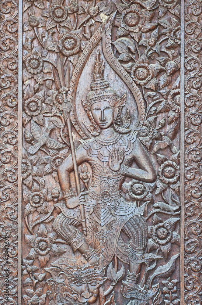 Angel woodcraft on temple door.