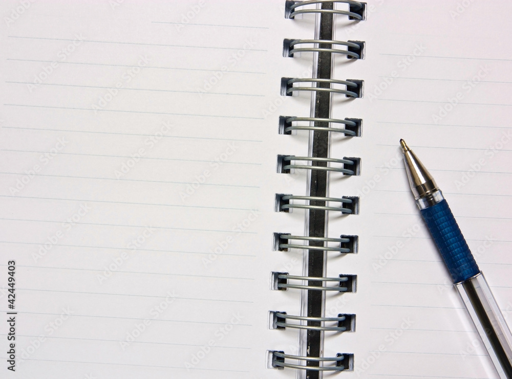 Notebook and pencil on a white background. Notebook and pencil on a white background.