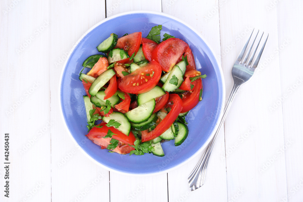 Fresh salad with tomatoes and cucumbers Fresh salad with tomatoes and cucumbers