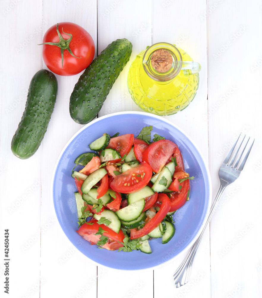 Fresh salad with tomatoes and cucumbers Fresh salad with tomatoes and cucumbers