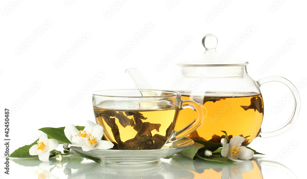 green tea with jasmine in cup and teapot isolated on white green tea with jasmine in cup and teapot isolated on white