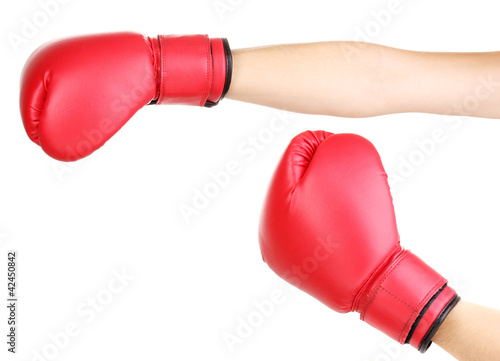 Red boxing gloves on hands isolated on white © Africa Studio