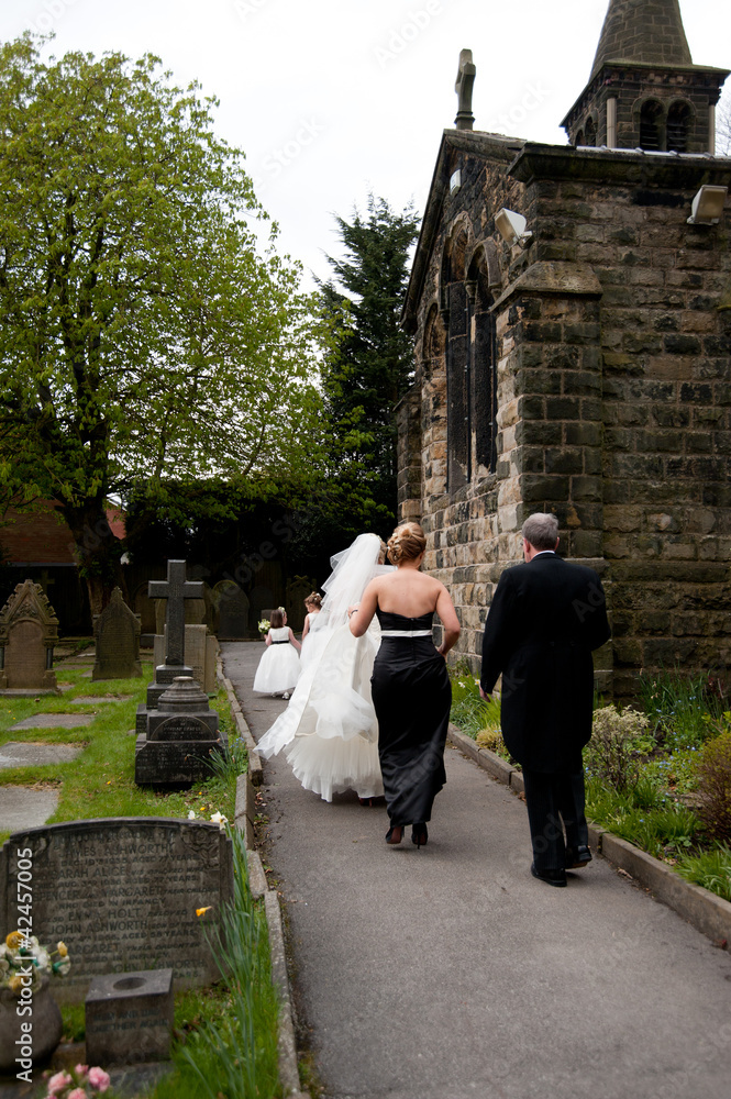 Bride walking to church