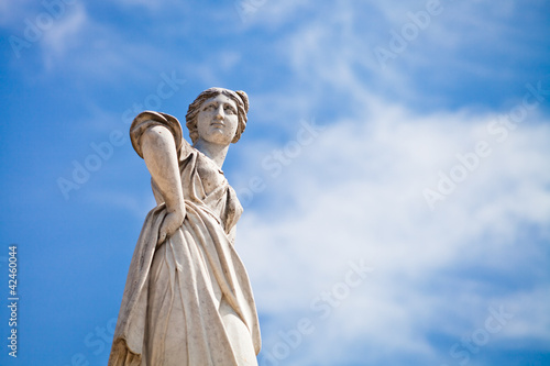 woman's statue in antique Roman style