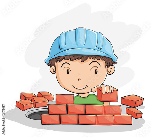 boy building wall