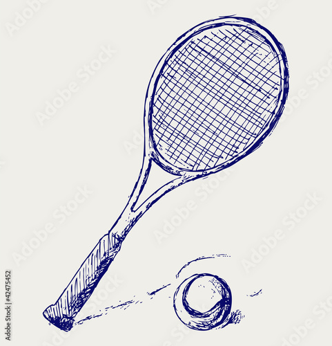 A tennis racket and ball