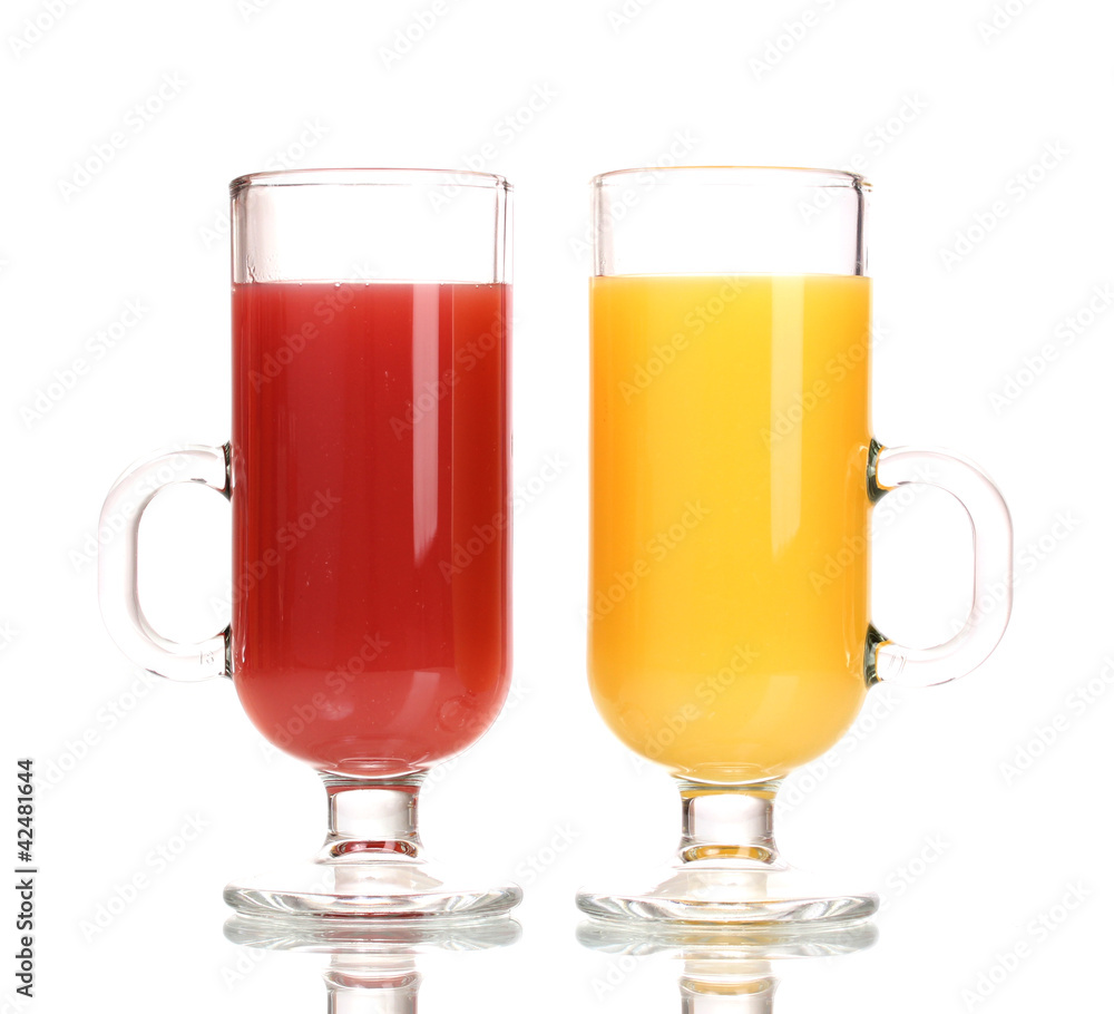 Tropical juices in glasses isolated on white Tropical juices in glasses isolated on white