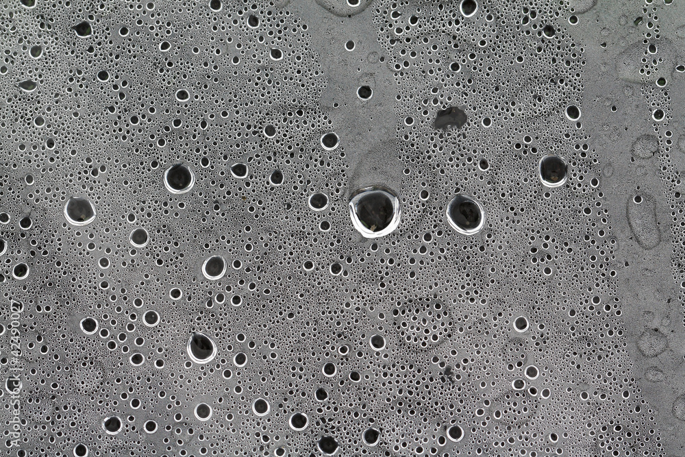 rain dripped on gray cellophane rain dripped on gray cellophane