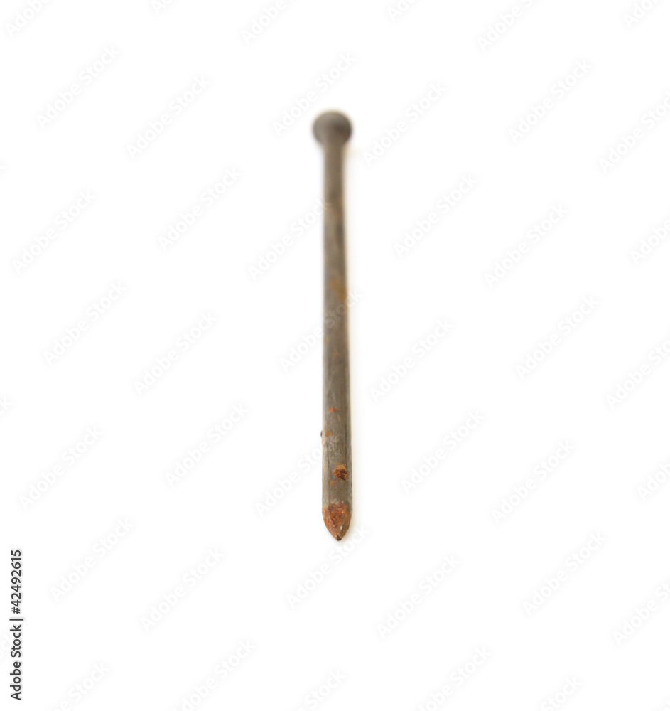 One metal nail isolated on a white background One metal nail isolated on a white background