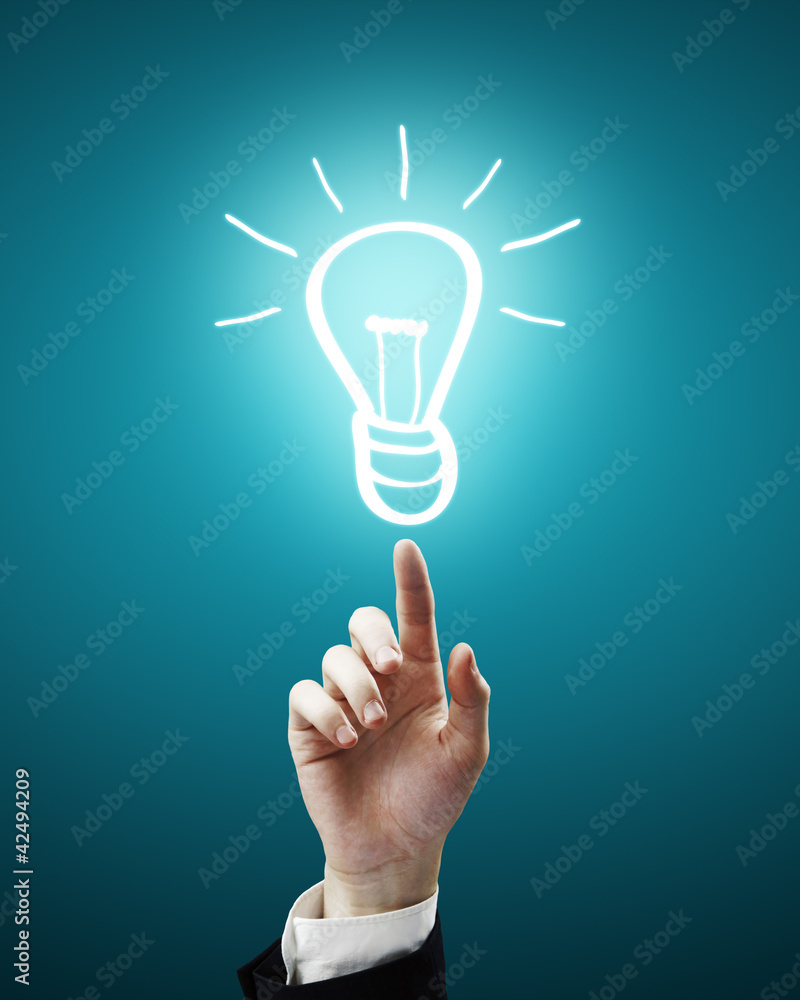 Photography bulb light symbol on fingertip