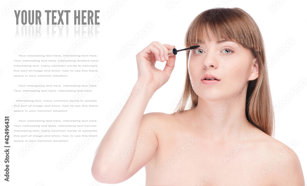 Beautiful woman with make up brush