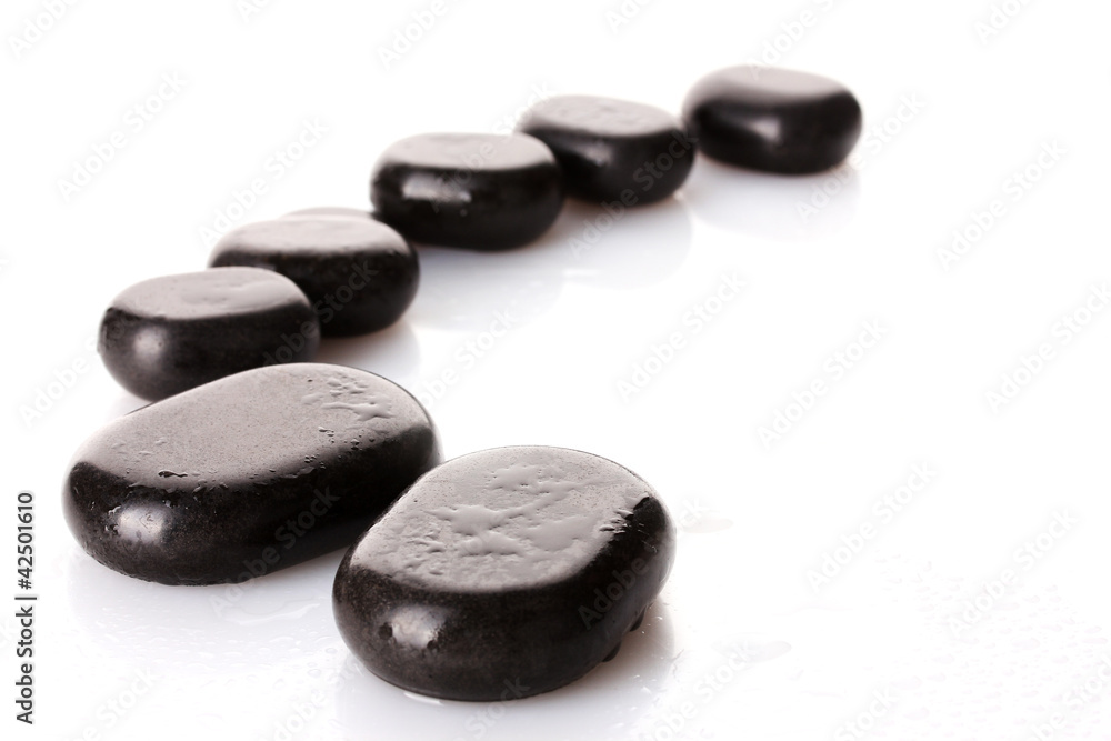 Spa stones with drops isolated on white Spa stones with drops isolated on white