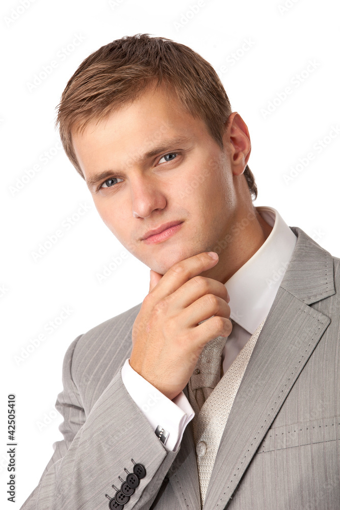 Closeup portrait of a young attractive man in an evening suit Closeup portrait of a young attractive man in an evening suit