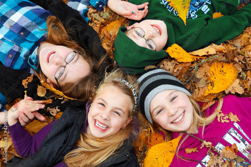 Fototapeta premium children outdoor on autumn leaves