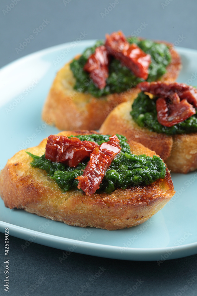 Crostini with sun-dried tomatoes Crostini with sun-dried tomatoes
