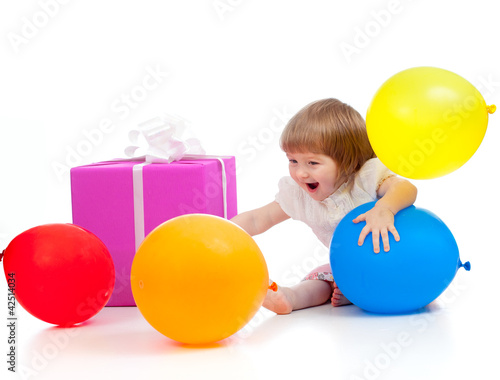 girl with colorful balloons and gift. Isolated on white.