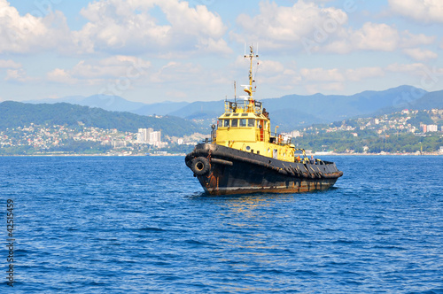 Yellow sea tow on anchor parking on spot-check of Sochi © catthesun