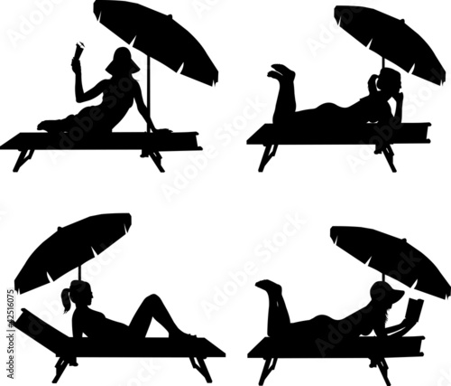 Silhouette of girl sunbathing on the beach