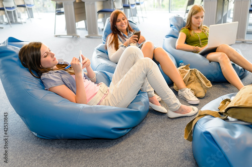 Group of students relax on beanbag
